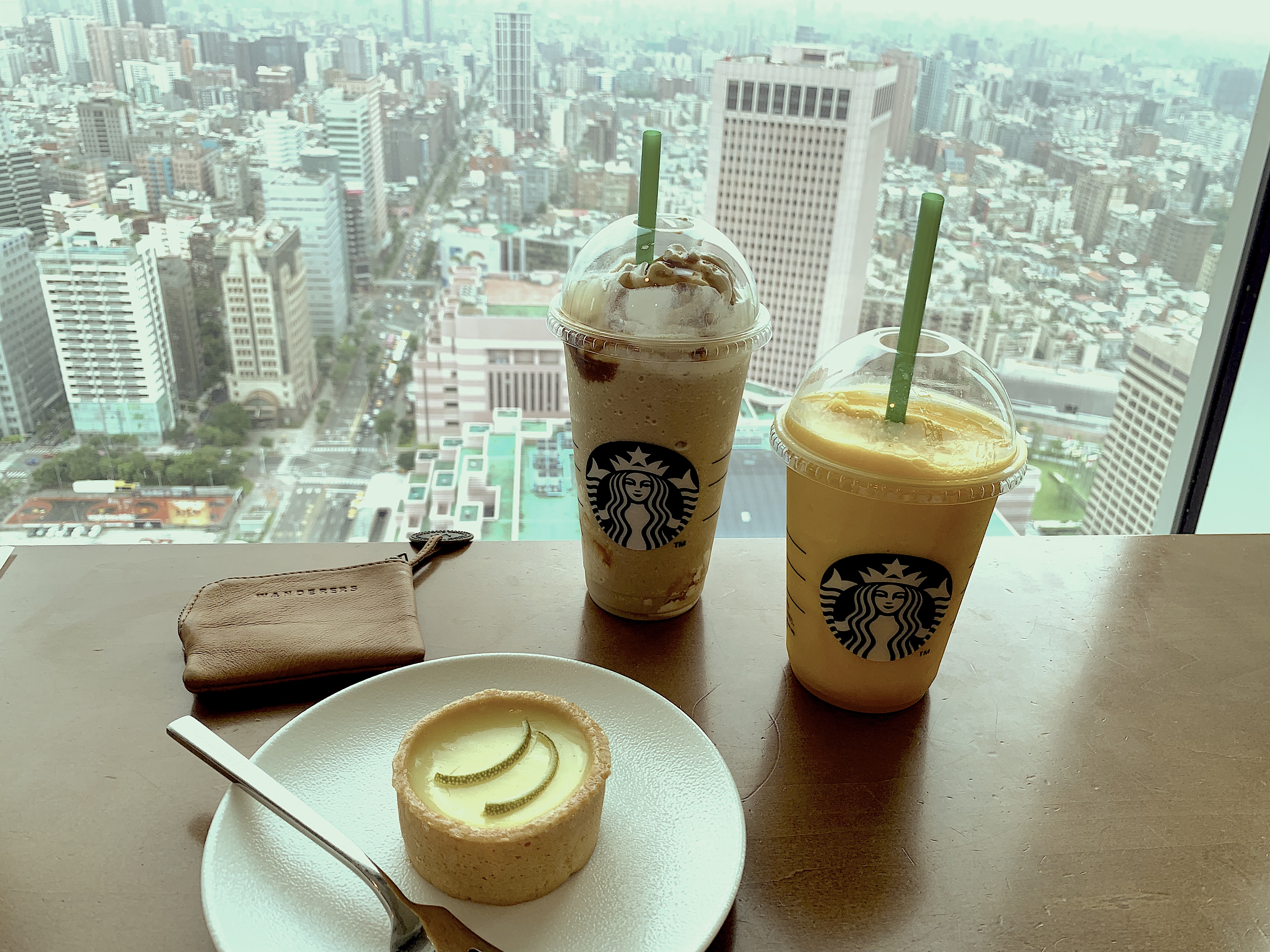 two-drinks-and-view-of-city-from-Starbucks-Taipei-101