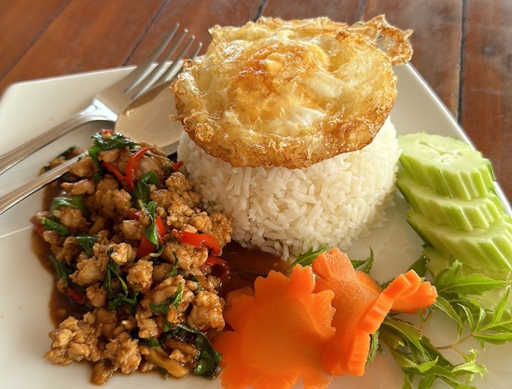 photo-of-thai-dish-eaten-by-person-with-peanut-allergy-a-basil-pork-stiryfry-with-rice-egg-and-salad